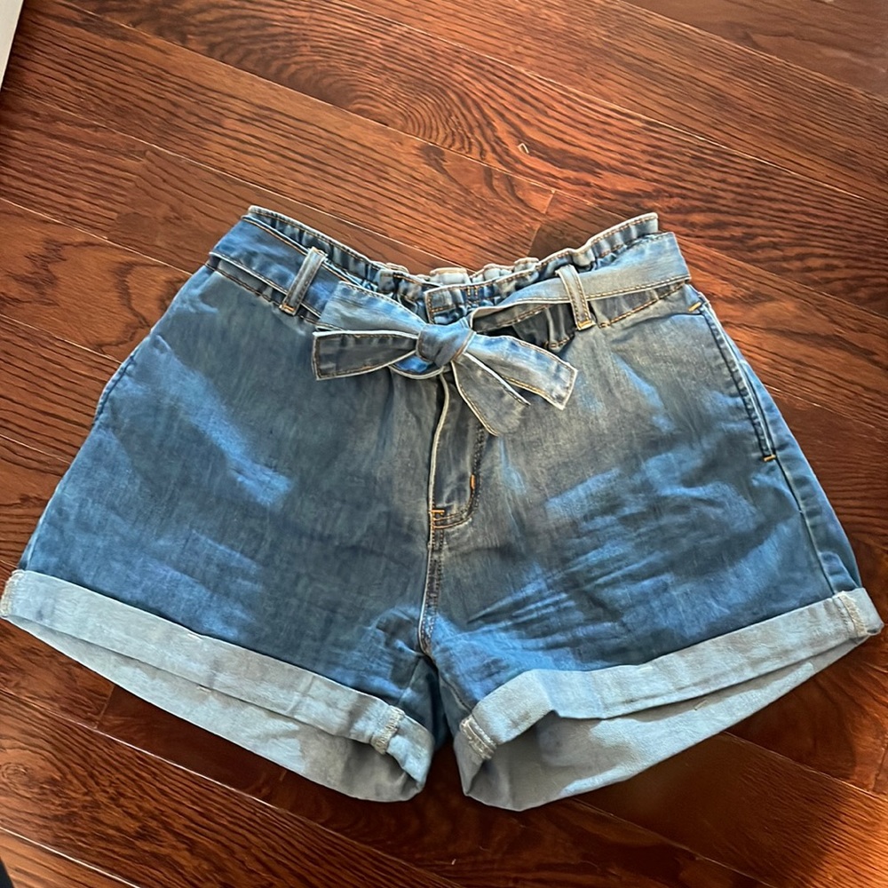 Medium wash high waisted paper bag denim shorts, size large